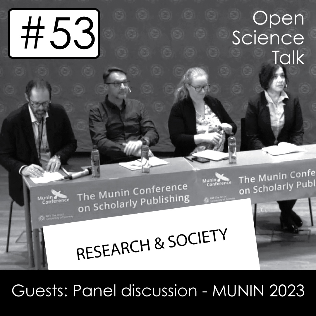 Panelists at the conference table.